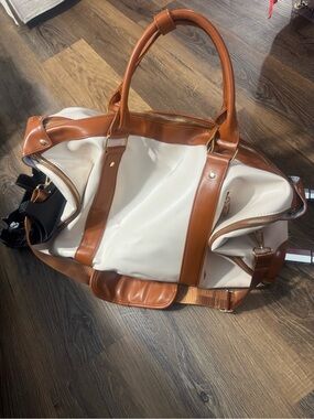 Stylish Cream and Tan Travel Duffel Bag with Wheels